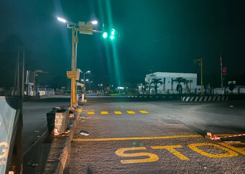 Solar traffic light junction at night